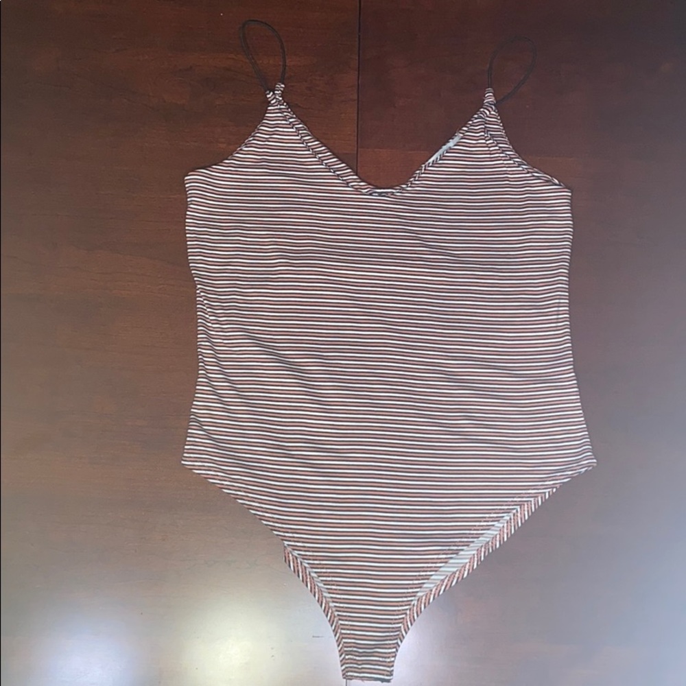 Peachy pink white and black striped body suit